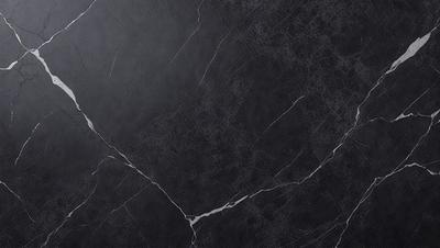 The primary subject of the image is a close-up of a black marble wall. The setting is a room with a black marble wall, which serves as the background. The visual style is a photo, capturing the details of the marble wall. The colors and mood of the image are predominantly black, giving it a sleek and modern appearance.