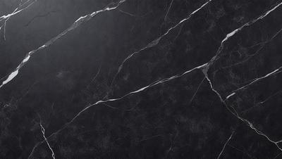 The primary subject of the image is a close-up of a black marble wall. The setting is a room with a black marble floor. The visual style is a photo, and the colors and mood are dark and moody.