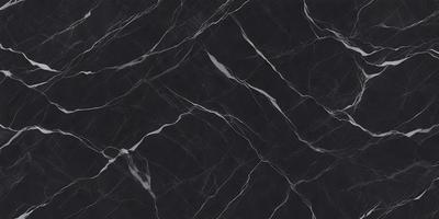 The primary subject of the image is a black marble countertop. The setting is a kitchen, with the countertop being the main focus of the scene. The visual style is a close-up of the marble countertop, showcasing its texture and pattern. The colors and mood of the image are predominantly dark, with the black marble countertop being the main source of contrast.