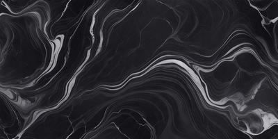 The primary subject of the image is a black and white marble pattern. The setting is a black background, which contrasts with the marble pattern. The visual style is a close-up of the marble pattern, showcasing its intricate details. The colors and mood of the image are predominantly black and white, giving it a classic and elegant appearance.