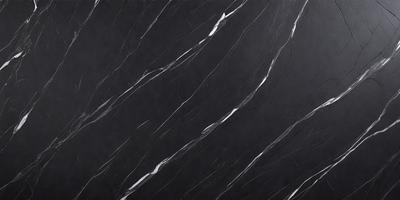 The primary subject of the image is a black marble countertop. The setting is a kitchen, with the countertop being the main focus of the scene. The visual style is a close-up of the marble countertop, showcasing its texture and pattern. The colors and mood of the image are dark and moody, with the black marble countertop being the dominant color.