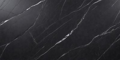 The primary subject of the image is a black marble countertop. The setting is a kitchen, with the countertop being the main focus of the scene. The visual style is a close-up of the marble countertop, showcasing its texture and details. The colors and mood of the image are predominantly dark, with the black marble countertop being the main source of contrast and visual interest.