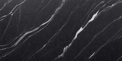The primary subject of the image is a black marble countertop with a pattern of white veins. The setting is a kitchen, and the visual style is a close-up of the marble countertop. The colors and mood of the image are predominantly black and white, giving it a classic and elegant appearance.