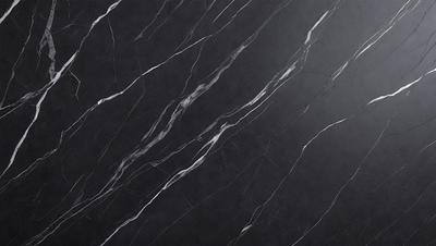 The primary subject of the image is a black marble countertop with a patterned design. The setting is a kitchen, and the visual style is a close-up of the marble countertop. The colors and mood of the image are dark and sophisticated, with the black marble providing a striking contrast against the lighter background.