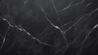 The primary subject of the image is a close-up of a marble countertop. The setting is a kitchen, with the countertop being the main focus of the scene. The visual style is a photo, capturing the intricate details of the marble surface. The colors and mood of the image are predominantly black and white, giving it a classic and elegant appearance.