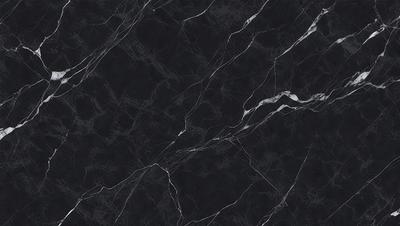 The primary subject of the image is a close-up of a marble countertop. The setting is a kitchen, with the countertop being the main focus of the scene. The visual style is a photo, capturing the intricate details of the marble surface. The colors and mood of the image are predominantly black, giving it a sleek and modern appearance.