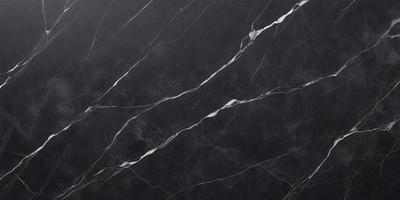 The primary subject of the image is a black marble countertop. The setting is a kitchen, with the countertop being the main focus of the scene. The visual style is a close-up of the marble countertop, showcasing its texture and details. The colors and mood of the image are predominantly dark, with the black marble countertop being the main source of contrast and visual interest.