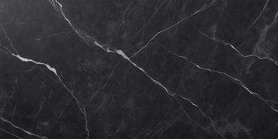 The primary subject of the image is a black marble countertop. The setting is a kitchen, with the countertop being the main focus of the scene. The visual style is a close-up of the marble countertop, showcasing its texture and details. The colors and mood of the image are predominantly dark, with the black marble countertop being the main source of contrast and visual interest.