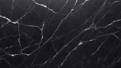 The primary subject of the image is a marble countertop with a black and white pattern. The setting is a kitchen, and the visual style is a close-up of the marble countertop. The colors and mood of the image are predominantly black and white, giving it a classic and elegant appearance.