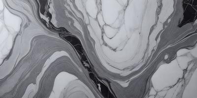 The primary subject of the image is a marble-like pattern, which appears to be a black and white photograph. The setting is a white marble surface, which serves as the background. The visual style is a close-up of the marble pattern, showcasing its intricate details. The colors and mood of the image are predominantly black and white, giving it a classic and elegant appearance.
