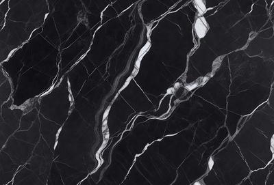 The primary subject of the image is a marble countertop with a black and white pattern. The setting is a kitchen, and the visual style is a close-up of the countertop. The colors and mood of the image are predominantly black and white, giving it a classic and elegant appearance.