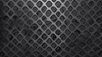 The primary subject of the image is a black and white patterned surface, which appears to be a marble or stone texture. The setting is a black background, which contrasts with the patterned surface. The visual style is a close-up of the pattern, showcasing the intricate details of the design. The colors and mood of the image are predominantly black and white, giving it a classic and elegant appearance.