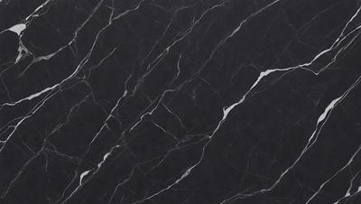 The primary subject of the image is a black marble countertop. The setting is a kitchen, with the countertop being the main focus of the scene. The visual style is a close-up of the marble countertop, showcasing its texture and pattern. The colors and mood of the image are predominantly dark, with the black marble countertop being the main source of contrast.