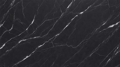 The primary subject of the image is a marble countertop with a black marble pattern. The setting is a kitchen, and the visual style is a close-up of the marble countertop. The colors and mood of the image are predominantly black and white, giving it a sleek and modern appearance.