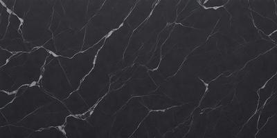 The primary subject of the image is a marble countertop with a black background. The countertop features a pattern of white and black marble, giving it a unique and elegant appearance. The visual style of the image is a close-up of the marble countertop, showcasing its intricate details and textures. The colors and mood of the image are predominantly black and white, creating a sophisticated and timeless atmosphere.