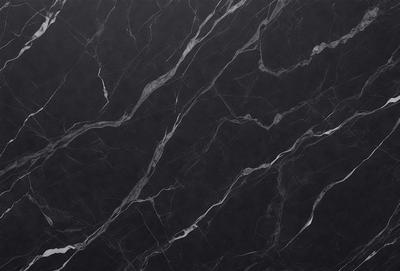 The primary subject of the image is a marble wall with a black and white pattern. The setting is a room with a black background, which emphasizes the marble pattern. The visual style is a close-up of the marble wall, showcasing its texture and pattern. The colors and mood of the image are predominantly black and white, giving it a classic and elegant appearance.
