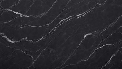 The primary subject of the image is a close-up of a marble surface, showcasing its intricate patterns and textures. The setting is a black background, which highlights the marble's natural beauty. The visual style is a high-quality photo, capturing the details of the marble surface. The colors and mood of the image are predominantly black and white, giving it a classic and elegant appearance.
