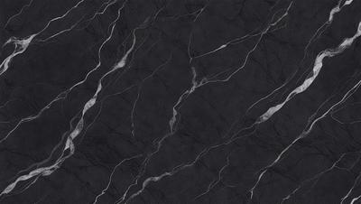 The primary subject of the image is a black marble countertop. The setting is a kitchen, with the countertop being the main focus of the scene. The visual style is a close-up of the marble countertop, showcasing its texture and pattern. The colors and mood of the image are predominantly dark, with the black marble countertop being the main source of contrast.