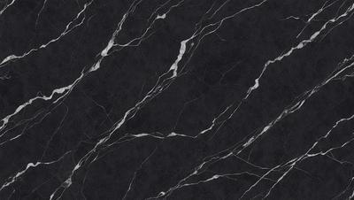 The primary subject of the image is a marble countertop with a black background. The countertop features a pattern of white and black swirls, giving it a unique and elegant appearance. The visual style of the image is a close-up of the marble countertop, showcasing its intricate design. The colors and mood of the image are predominantly black and white, creating a sophisticated and timeless atmosphere.
