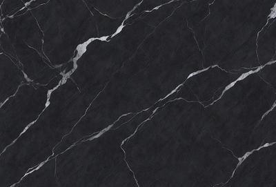 The primary subject of the image is a black marble countertop. The setting is a kitchen, with the countertop being the main focus of the scene. The visual style is a close-up of the marble countertop, showcasing its texture and pattern. The colors and mood of the image are predominantly dark, with the black marble countertop being the main source of contrast.