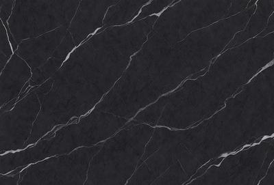 The primary subject of the image is a black marble countertop. The setting is a kitchen, with the countertop being the main focus of the scene. The visual style is a close-up of the marble countertop, showcasing its texture and pattern. The colors and mood of the image are predominantly dark, with the black marble countertop being the main source of contrast.