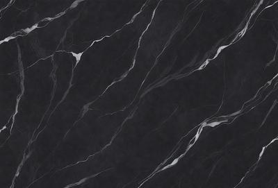 The primary subject of the image is a black marble countertop. The setting is a kitchen, with the countertop being the main focus of the scene. The visual style is a close-up of the marble countertop, showcasing its texture and pattern. The colors and mood of the image are predominantly dark, with the black marble countertop being the main source of contrast.