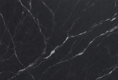 The primary subject of the image is a marble countertop with a black background. The countertop features a pattern of white and black swirls, giving it a unique and elegant appearance. The visual style of the image is a close-up of the marble countertop, showcasing its intricate design. The colors and mood of the image are predominantly black and white, creating a sophisticated and timeless atmosphere.