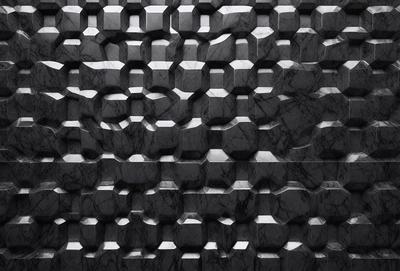 The primary subject of the image is a marble wall with a pattern of squares. The setting is a black and white photo, which gives the image a classic and timeless appearance. The visual style is a close-up of the marble wall, showcasing the intricate pattern of the squares. The colors and mood of the image are predominantly black and white, creating a sense of elegance and sophistication.
