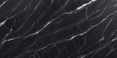 The primary subject of the image is a black marble countertop. The setting is a kitchen, with the countertop being the main focus of the scene. The visual style is a close-up of the marble countertop, showcasing its texture and pattern. The colors and mood of the image are predominantly dark, with the black marble providing a striking contrast against the dark background.
