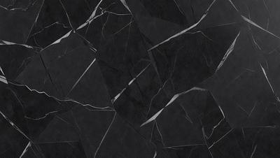 The primary subject of the image is a black and white marble tile wall. The setting is a room with a black and white marble tile floor. The visual style is a close-up of the marble tile wall, showcasing its texture and pattern. The colors and mood of the image are predominantly black and white, giving it a classic and elegant appearance.