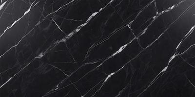 The primary subject of the image is a black marble countertop. The setting is a kitchen, with the countertop being the main focus of the scene. The visual style is a close-up of the marble countertop, showcasing its texture and pattern. The colors and mood of the image are predominantly dark, with the black marble countertop being the main source of contrast.