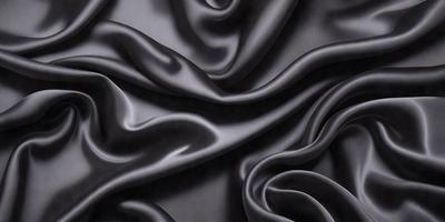 The primary subject of the image is a close-up of a black fabric, possibly a piece of clothing or a curtain. The setting is a dark background, which emphasizes the fabric's texture and appearance. The visual style is a detailed, realistic representation of the fabric. The colors and mood are predominantly dark and moody, with the black fabric being the main focus of the image.
