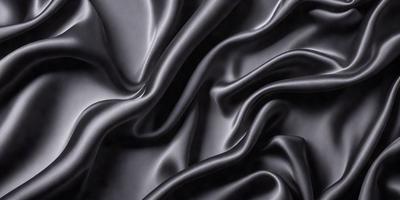 The primary subject of the image is a close-up of a black fabric, possibly a piece of silk or velvet. The setting is a dark background, which emphasizes the fabric's texture and appearance. The visual style is a black and white photo, which adds a timeless and classic feel to the image. The colors and mood are predominantly dark and moody, with the black fabric serving as the focal point of the scene.