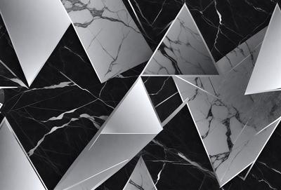The primary subject of the image is a black and white marble pattern. The setting is a black background, and the visual style is a pattern or texture. The dominant colors are black and white, creating a classic and elegant atmosphere.