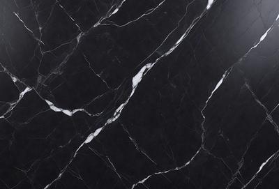 The primary subject of the image is a marble countertop with a black and white pattern. The setting is a kitchen, and the visual style is a close-up of the marble countertop. The colors and mood of the image are predominantly black and white, giving it a classic and elegant appearance.