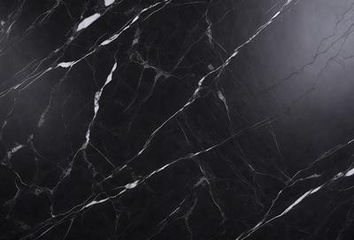The primary subject of the image is a marble countertop with a black and white pattern. The setting is a kitchen, and the visual style is a close-up of the marble countertop. The colors and mood of the image are predominantly black and white, giving it a classic and elegant appearance.