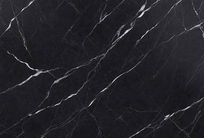 The primary subject of the image is a marble countertop with a black and white pattern. The setting is a kitchen, and the visual style is a close-up of the marble countertop. The colors and mood of the image are predominantly black and white, giving it a classic and elegant appearance.