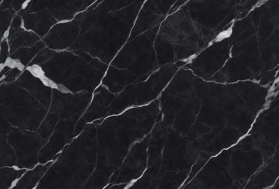 The primary subject of the image is a black marble countertop. The setting is a kitchen, with the countertop being the main focus of the scene. The visual style is a close-up of the marble countertop, showcasing its texture and pattern. The colors and mood of the image are predominantly black, giving it a sleek and modern appearance.