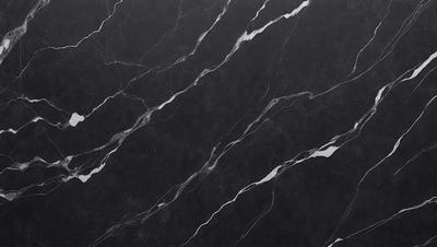 The primary subject of the image is a marble countertop with a black and white pattern. The setting is a kitchen, and the visual style is a close-up of the marble countertop. The colors and mood of the image are predominantly black and white, giving it a classic and elegant appearance.