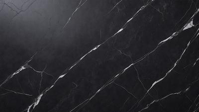 The primary subject of the image is a black marble countertop. The setting is a kitchen, with the countertop being the main focus of the scene. The visual style is a close-up of the marble countertop, showcasing its texture and details. The colors and mood of the image are dark and moody, with the black marble countertop being the dominant color.