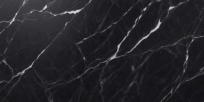The primary subject of the image is a black marble countertop. The setting is a kitchen, with the countertop being the main focus of the scene. The visual style is a close-up of the marble countertop, showcasing its texture and pattern. The colors and mood of the image are predominantly dark, with the black marble countertop being the main source of contrast.