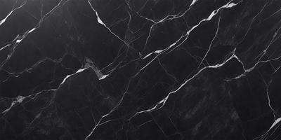 The primary subject of the image is a black marble countertop. The setting is a kitchen, with the countertop being the main focus of the scene. The visual style is a close-up of the marble countertop, showcasing its texture and pattern. The colors and mood of the image are predominantly dark, with the black marble countertop being the main source of contrast.