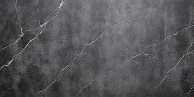 The primary subject of the image is a grey marble wall with visible cracks and crevices. The setting is a room with a grey marble floor. The visual style is a close-up of the marble wall, showcasing its texture and details. The colors and mood of the image are predominantly grey, giving it a somewhat moody and dramatic appearance.