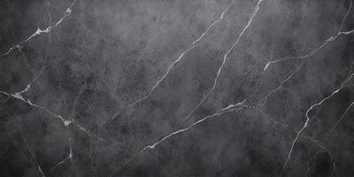The primary subject of the image is a grey marble wall with visible cracks and crevices. The setting is a room with a grey marble floor. The visual style is a close-up of the marble wall, showcasing its texture and details. The colors and mood of the image are predominantly grey, giving it a somewhat moody and dramatic appearance.