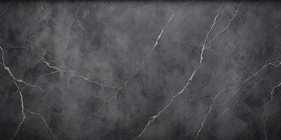 The primary subject of the image is a grey stone wall with visible cracks and crevices. The setting is a grey stone wall, which serves as the backdrop for the image. The visual style is a close-up of the grey stone wall, showcasing its texture and details. The colors and mood of the image are predominantly grey, giving it a somewhat dull and aged appearance.