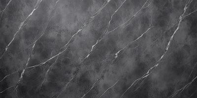 The primary subject of the image is a gray marble wall with a pattern of white lines. The setting is a room with a gray background. The visual style is a close-up of the marble wall, showcasing its texture and pattern. The colors and mood of the image are predominantly gray, giving it a calm and sophisticated atmosphere.