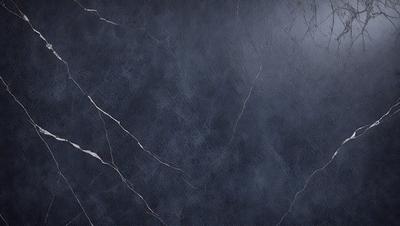The primary subject of the image is a blue marble wall with a rough texture. The setting is a room with a blue color scheme. The visual style is a close-up of the marble wall, showcasing its unique texture. The colors and mood of the image are predominantly blue, creating a calm and serene atmosphere.