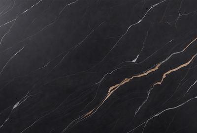 The primary subject of the image is a black marble countertop. The setting is a kitchen, with the countertop being the main focus of the scene. The visual style is a close-up of the marble countertop, showcasing its texture and pattern. The colors and mood of the image are dark and moody, with the black marble countertop being the dominant color.
