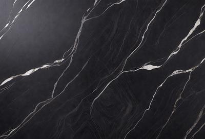 The primary subject of the image is a marble countertop with a black and white pattern. The setting is a kitchen, and the visual style is a close-up of the marble countertop. The colors and mood of the image are predominantly black and white, giving it a classic and elegant appearance.