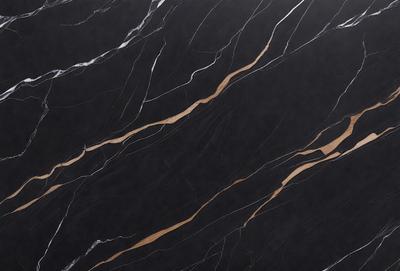 The primary subject of the image is a black marble countertop with a wood grain pattern. The setting is a kitchen, and the visual style is a close-up of the marble countertop. The colors and mood of the image are dark and dramatic, with the black marble and wood grain pattern creating a striking contrast against the dark background.